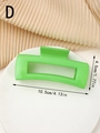 Detalle de pinza de pelo verde brillante con dimensiones de 10,5 cm y 4,5 cm - Verde