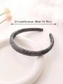 Detail view of paisley pattern headband with 38cm circumference on white plate - Gray