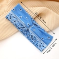 Dettaglio fascia yoga blu motivo paisley con nodo e dimensioni di 21cm x 9cm - Fascia Paisley Celeste