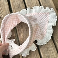 Detailed view of pink plaid cotton pet headscarf with elegant white ruffled chiffon edges - Pink