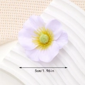 Detail shot of a lilac silk fabric artificial flower head showing its 5cm diameter size - 5cm Style / Lavender