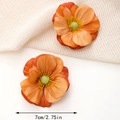 Detail view of 7cm orange silk artificial poppy flower hair clips with fabric texture - 7cm Style / Orange