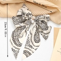 Fermaglio per capelli con fiocco in chiffon paisley crema e dettagli di perle - Bianco