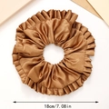 Chouchou géant en soie marron avec mesure de 18 cm de diamètre sur fond blanc - Marron
