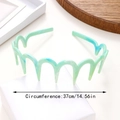 Cerchietto ondulato con denti in resina marmorizzata verde menta e blu, 37 cm - Verde