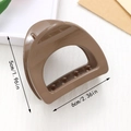 Brown semi-circular hair claw clip in minimalist resin finish, size 6cm x 5cm - Camel