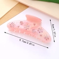 Detail view of pink rhinestone shark hair clip with measurements 9.7cm length - Pink Oval