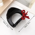 7cm black polished claw clip featuring a vibrant red 3D bow accent for women - Solid Red Bow