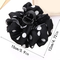 Large black and white polka dot hair claw clip with satin finish and size markings - Black