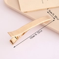 Pinza larga minimalista de metal dorado de 12cm con acabado de textura cepillada - Dorado