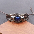 Luminous multilayer leather bracelet featuring Gemini constellation glass charm and beads - Gemini