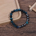 Close-up of 8mm tiger eye beads and hematite spacers on a beaded couple bracelet - Light Blue Tiger Eye