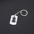 Minimalist silver stainless steel keychain featuring a cutout letter B charm and keyring - Letter B