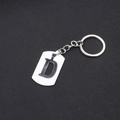 Minimalist silver stainless steel keychain featuring a hollowed-out letter D pendant - Letter D