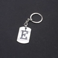 Minimalist silver stainless steel keychain featuring a hollowed-out letter E pendant - Letter E