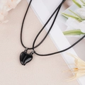 Detailed view of black magnetic heart pendants with woven ropes for couples necklaces - Black Magnetic Style (NST-0213-16)