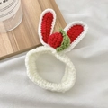 Handmade crochet bunny ear hair scrunchie with red strawberry charm in white knit yarn - White
