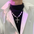 Close-up of baroque pearl necklace with silver rhinestone cross pendant on model - Rhinestone Pearl Cross Style (NST-0219)