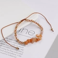 Detail view of Bohemian amber stone beads and gold crystals on adjustable woven bracelet - Red Agate Color