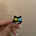 Anillo de gato negro divertido con ojos heterocromáticos amarillo y azul y ajustable - Gato Negro