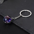 Portachiavi con sfera di vetro costellazione e motivo galassia Toro su pietra nera - Toro Sognante