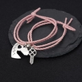 Magnetische Freundschaftsarmbänder in Rosa mit Herz- und Schlüsselanhängern - Rosa Geflochtenes Seil Herz Schlüssel Stil / Rosa (BM-0072)