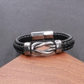 Close-up of men's black braided leather bracelet with silver metal knot and magnetic clasp - Black / Silver Alloy Clasp