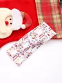 Detail of Christmas headband featuring Merry Christmas print and soft twisted knot design - Style P