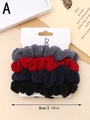 Detailed view of four colorful plush hair scrunchies with 8cm size dimension and soft texture - Grey Red Blue Black (A)