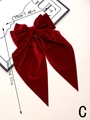 Detail showing red velvet bow hair clip dimensions 19cm by 36cm with elegant streamers - Deep Red (C)