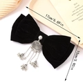 Size detail of black velvet bow hair clip with silver bell tassels and dimensions - Black