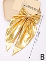 Detail showing dimensions of a large golden metallic bow clip with long ribbons - Gold (B)