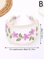 Dettaglio della fascia in pizzo ricamato da 8cm con motivi floreali rosa su rete - Fiori Viola (B)