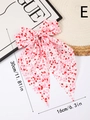 Pink bow hair clip with red heart prints and long ribbons, measuring 30cm by 16cm - E (Dense Heart Print)
