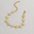 Detailed close-up of a gold daisy enamel beaded bracelet with lobster clasp and extension chain - 全雏菊链(S-B1091)