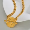 Macro detail of golden chain necklace with spiral textured pendant and five crystals - Vintage Circular Disc Rhinestone Cuban Link Necklace (S-N2173)