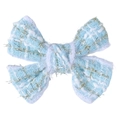 Gros plan sur un nœud papillon en tweed bleu clair avec fils métalliques et texture tissée - Nœud Rayé Bleu