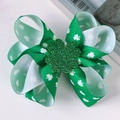 Close-up of Saint Patrick's Day green clover bow clip with white shamrock pattern - Irish Festival Green White Shamrock Print Pair Clips (5#)