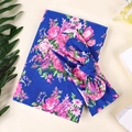 Detailed view of dark blue floral swaddle blanket and matching bow headband set for newborns - Dark Blue
