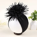 Detailed view of handmade 3D floral decoration on black baby turban hat with rhinestones - Black