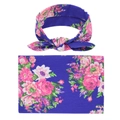 Detailed view of soft floral baby swaddle set in navy blue with matching bow headband - Navy Floral Style (2)