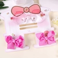 Set occhiali da sole a cuore rosa e fermagli per capelli con fiocco per bambine - Occhiali esagonali e farfalla 3D rosa