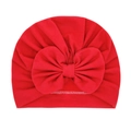 Soft red baby turban hat featuring a large decorative bow made from ribbed knit cotton - Red