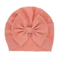 Bonnet turban côtelé rose corail pour bébé avec un grand nœud décoratif - Bourgeon de Neige