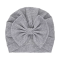 Light grey cotton baby turban hat featuring a large bow and soft ribbed knit texture - Gray
