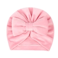 Soft pink velvet baby beanie with a large bow detail and elegant pleated design - Pink
