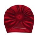 Detail view of dark red velvet baby turban hat featuring a round knot and soft texture - Red (Round Ball)