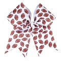 Macro detail of high-quality grosgrain bow hair tie with American football print patterns - Rugby Ball
