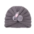 Dark grey knitted infant turban hat with a cute 3D plush bunny decoration on white background - Gray