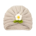 Chunky knit baby turban hat in oatmeal beige with a white flower and green leaf detail - White